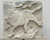Antique decorative brick with a horse and clouds