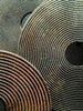 Bi-disc in dark brown tones with carved circles - Design interiors