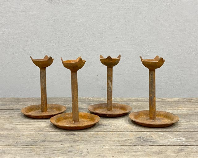 Short rusty candle holder
