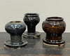 Uniquely shaped antique black pots