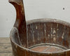 Weathered wooden water bucket